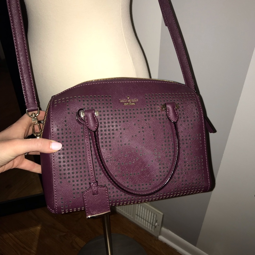 Burgundy Kate Spade eyelet cross body purse